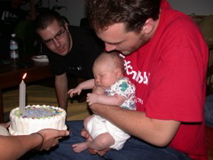 Sleeping through his first birthday song.
