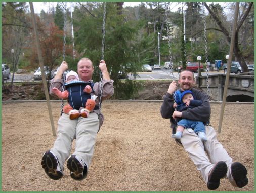 Papas take their babies for a swing